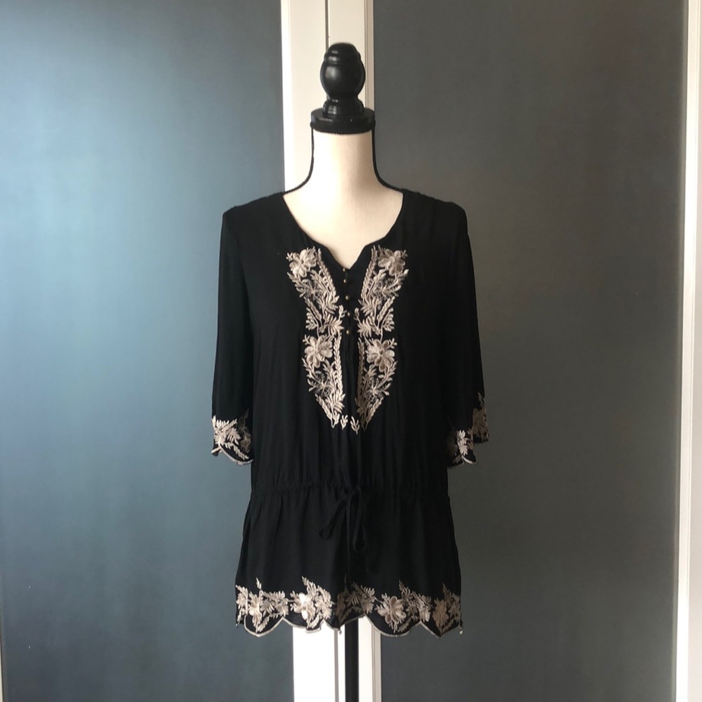 Black tunic with embroidery detail